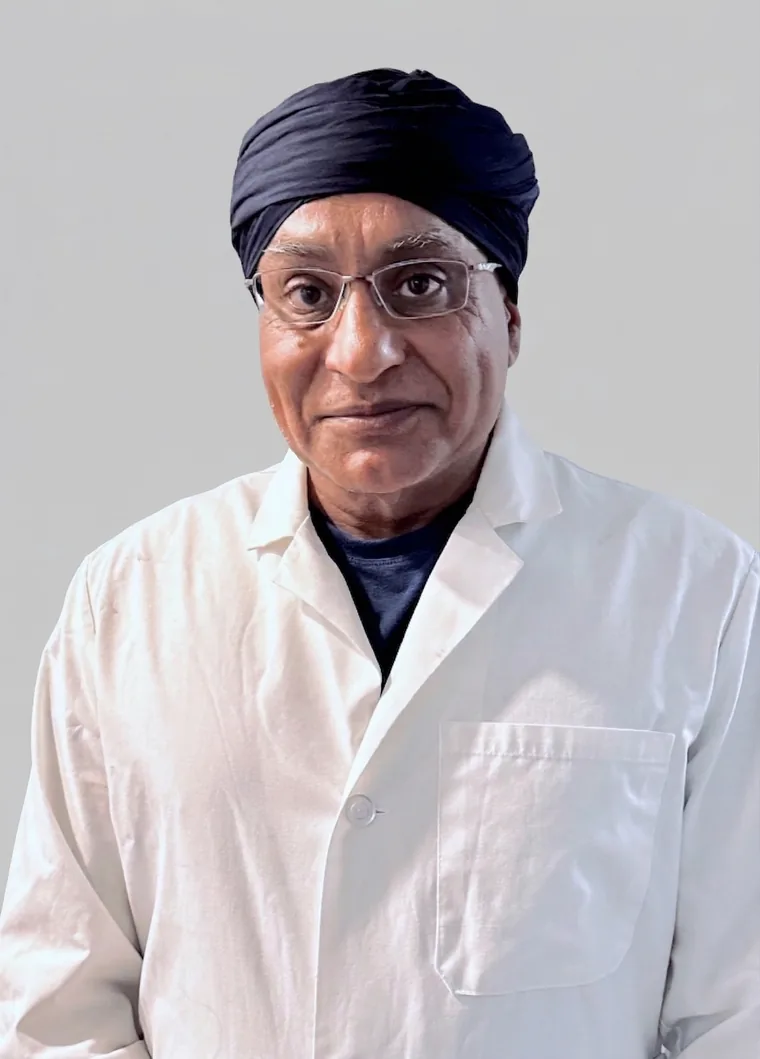 Dr. Gurpreet Singh Padda, MD, MBA, physician owner and medical director of Regenerve in St. Louis, in a white clinical lab coat